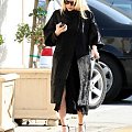 Ashley out and about in a black fur coat