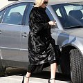 Ashley out and about in a black fur coat